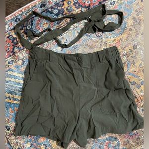 Green linen shorts with tie belt